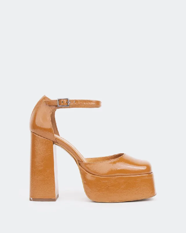 Women's mule - style stiletto heel pumps with a bow accentAzucar Cognac Naplack