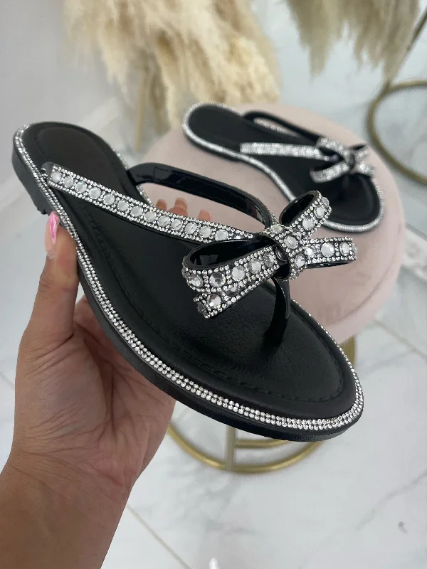 Women's Sandals with a Glitter - Coated Strap in Gold for a Sparkly Summer Outfit Women's Sandals with a Glitter - Coated Strap in Gold for a Sparkly Summer Outfit Elastic - Strap Women's Sandals with a Padded Toe in Teal for Easy On - and - OffRossi - Black Diamanté Bow Flat Flip Flop Sandals Women's Sandals with a Glitter - Coated Strap in Gold for a Sparkly Summer Outfit Women's Sandals with a Glitter - Coated Strap in Gold for a Sparkly Summer Outfit Elastic - Strap Women's Sandals with a Padded Toe in Teal for Easy On - and - OffRossi - Black Diamanté Bow Flat Flip Flop Sandals