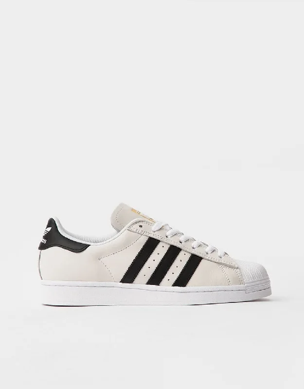 Brand - Endorsed Women's Skateboarding Shoes by [Popular Brand] in Maroonadidas Superstar ADV Skate Shoes - White/Core Black/Gold Metallic